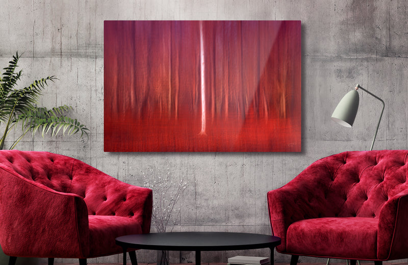 Metal print hanging on modern concrete interior