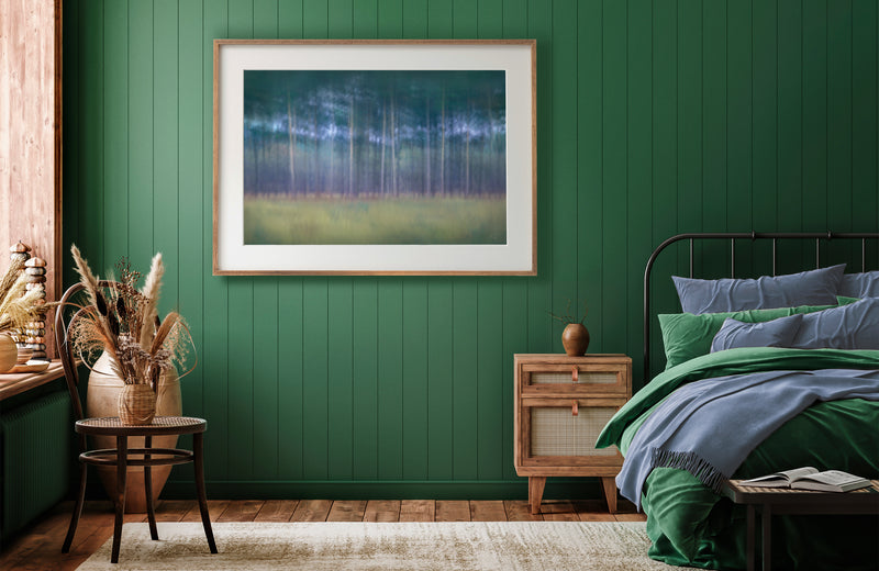 print in green bedroom with blue accents