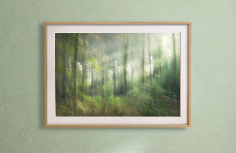 framed print on green wall