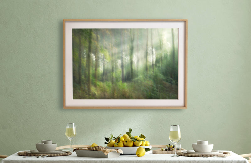 framed print on wall above dining room table green yellow pastells